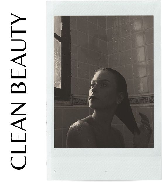 flora amazon model showering using hair products from brazil that embrace clean beauty.