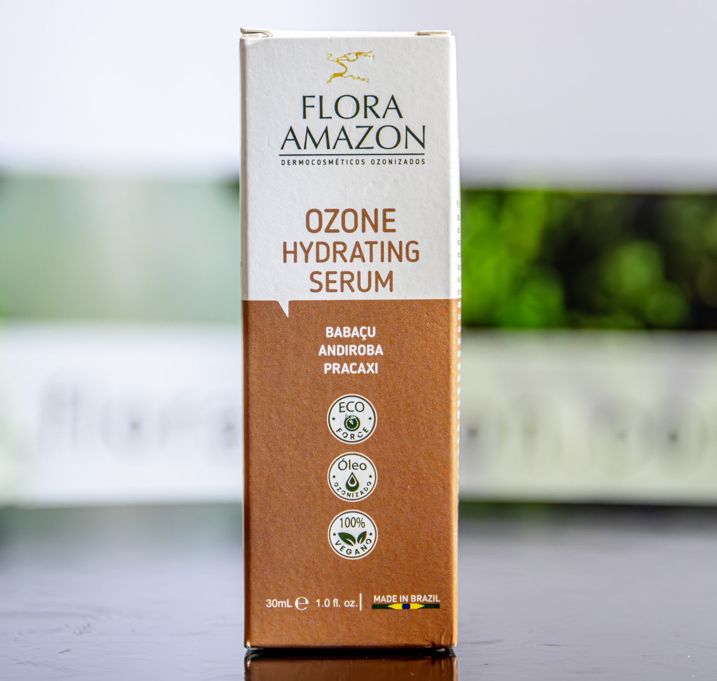 natural ozone hydrating serum package, with vegan and botanical extract icons.